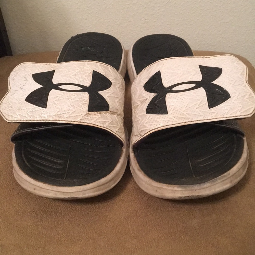 Black and white under armor slides
